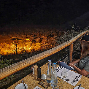 2025-09-24 103 Annette and Rhinos at Ongava Lodge Waterhole.jpg