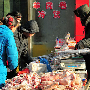 Markt in Huanan,
Marktstand
(9800)