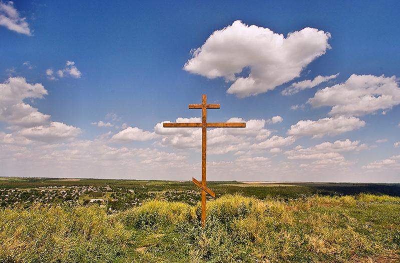 cross at the  top of the mountain