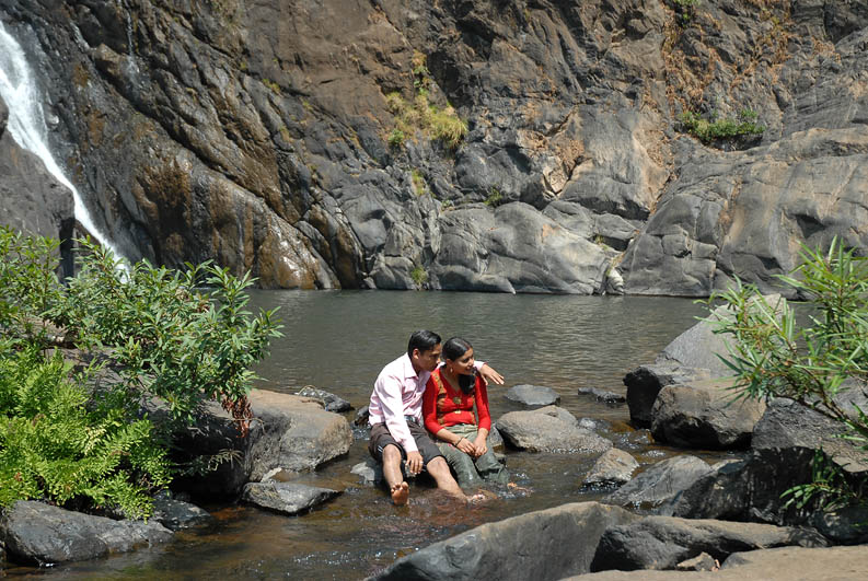 Indian lovers by the waterfal