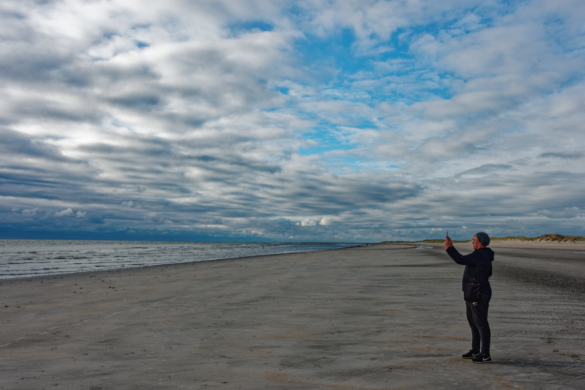 Sonne, Wolken, Strand
