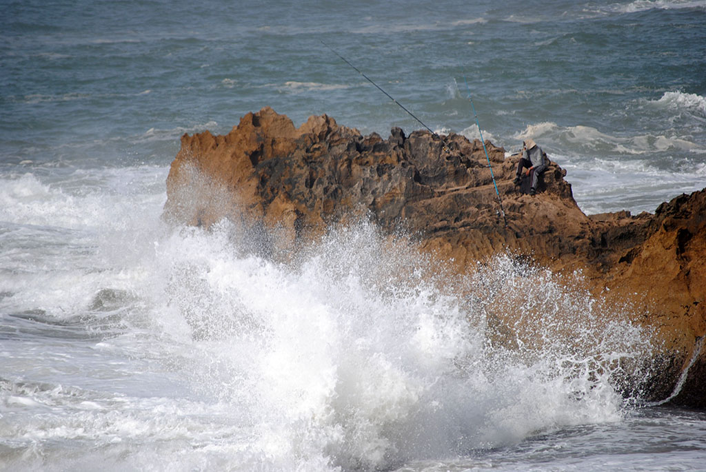 the angler on the cliff